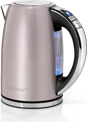 A rose gold Cuisinart electric kettle with a black handle and silver accents, set against a white background.