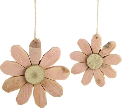 Two wooden flower decorations hanging against a white background.