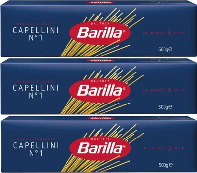 Three boxes of Barilla Capellini pasta stacked vertically.