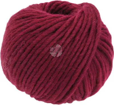 A ball of burgundy yarn.