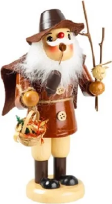 Räuchermännchen Kräutersammler mit braunen Hut und Mantel und trägt einen Korb mit frischen Kräutern