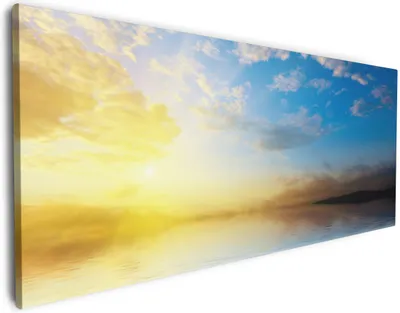 Produktbild von Wallario Premium Leinwandbild Sonnenuntergang über dem Meer I in Größe 50 x 125 cm