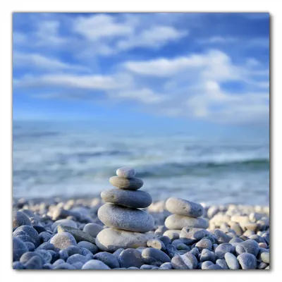 Produktbild von Wallario selbstklebende Möbelfolie/ Tischdecke für Innen und Außen, Größe: 90 x 90 cm - Steinstapel am Strand