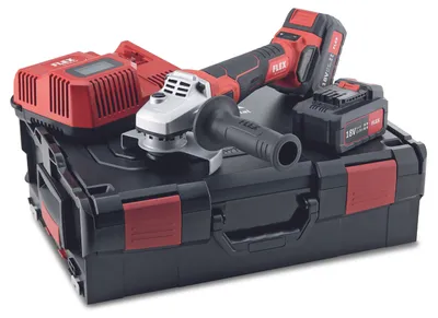 A cordless angle grinder set with batteries and charger on a storage case.