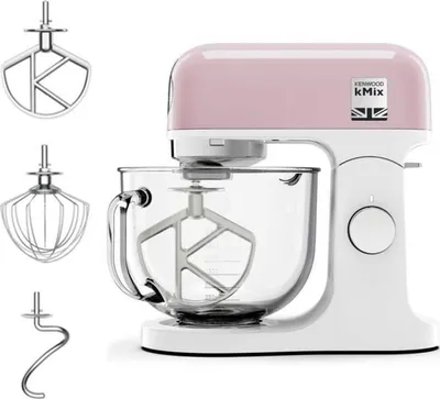 A pink and white Kenwood stand mixer with three attachments displayed to the left.
