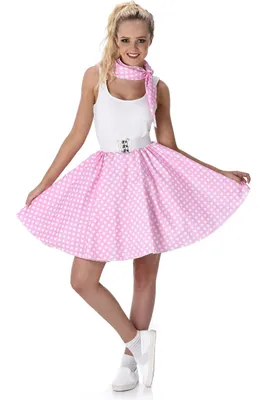 A woman is posing in a 50s-style outfit.