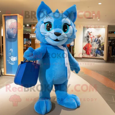 Produktbild von Blaue REDBROKOLY Katze Maskottchen Kostüm figur bekleidet mit einer Vertuschung und Tragetaschen