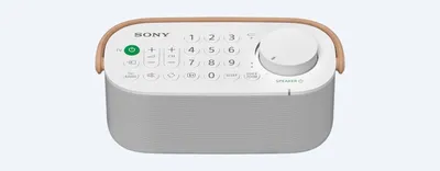 A white Sony SRS-LSR200 portable speaker with a wood-grain accent on a white background.