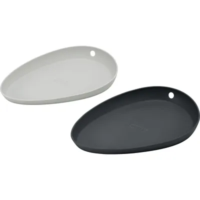 Two oval-shaped trays, one gray and one white, are shown against a white background.