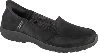 A studio shot of a single black Skechers slip-on sneaker.