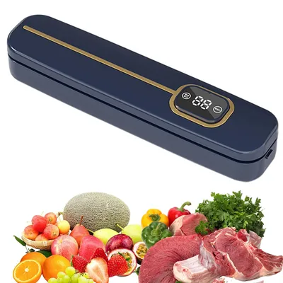 A vacuum sealer machine above a collection of fresh produce and raw meat.