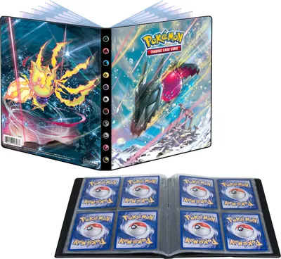A Pokémon trading card binder is shown open, displaying cards inside, with another open binder in the background.