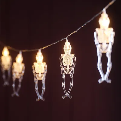 Halloween Lichterkette 1,8 m mit 10 Skeletten, warmweiße LED