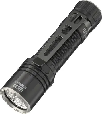 A black tactical flashlight with a silver clip is shown against a white background.