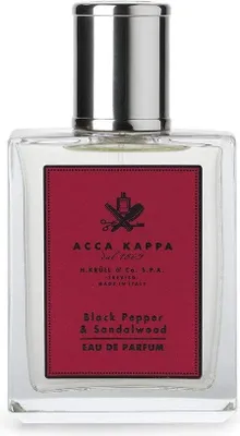 A clear, well-lit studio shot of a perfume bottle.