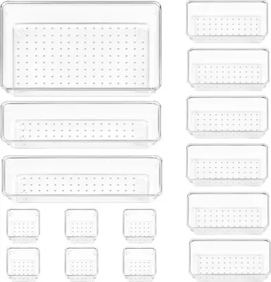 A collage of clear plastic drawer organizers of various sizes.