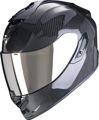 A black carbon fiber motorcycle helmet with a silver visor, shown from the front-left.