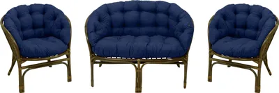 A set of three rattan furniture pieces with navy blue cushions, arranged against a white background.