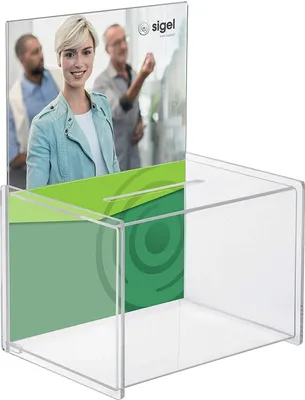 A clear acrylic donation box with a promotional insert featuring people and a logo.