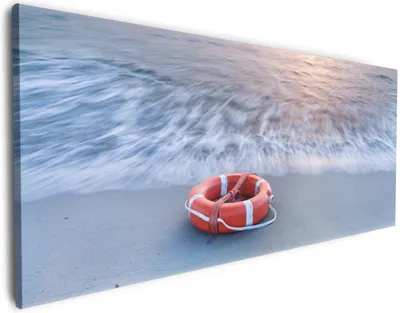 Produktbild von Wallario Premium Leinwandbild Rettungsring am Strand bei Sonnenuntergang in Größe 60 x 150 cm