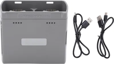 A gray battery charging hub and two black charging cables are shown against a white background.