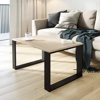 A modern living room scene with a couch and coffee table.