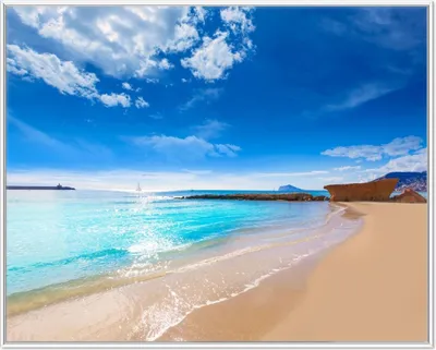 Produktbild von Wallario Wandbild Traumstrand unter blauem Himmel, Größe: 40,30 x 50,30 cm, Poster mit weißem Aluminiumrahmen