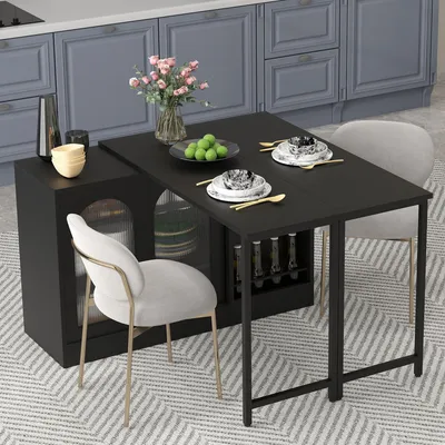 A black dining table with chairs and a sideboard in a kitchen setting.