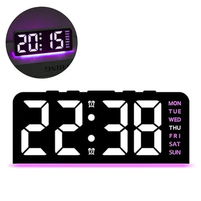A digital alarm clock with a purple backlight is shown.