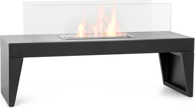 A black ethanol fireplace with a glass wind guard and visible flames, set against a white background.