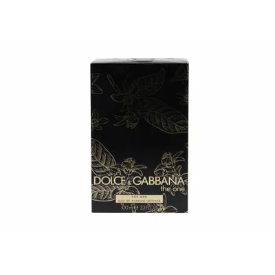 A black box with gold floral patterns and text.