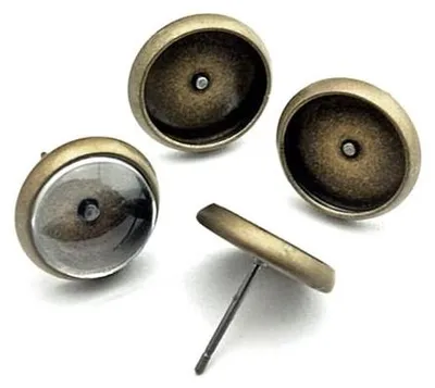 Produktbild von Vintageparts 10 Ohrstecker antik Bronze für 10 mm Cabochon, Messing mit Silikonstopper