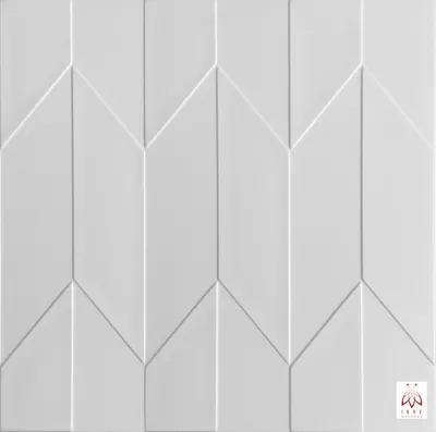 A white textured wall panel with a geometric pattern.