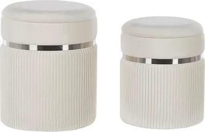 Produktbild von BELIANI Pouf Cremeweiß 2er Set Samtstoff mit Stauraum rund glänzende Metallverzierung Flur Wohnzimmer Salon Schlafzimmer Deko Sitzhocker