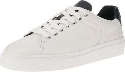 A white leather sneaker with black accents.