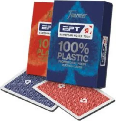 Two decks of Fournier playing cards, one red and one blue, are shown with two cards laid out in front of them.
