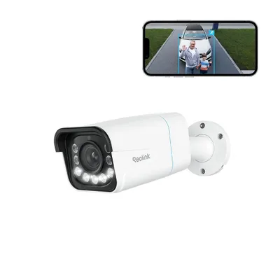 A security camera and a smartphone displaying a live feed from the camera.