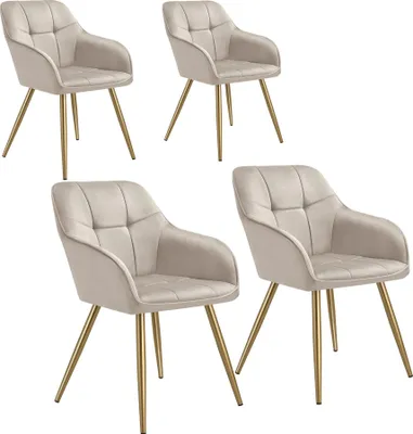 Four beige upholstered dining chairs with gold legs are arranged in a grid against a white background.