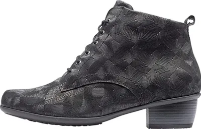 A side view of a black women's boot with a textured pattern.