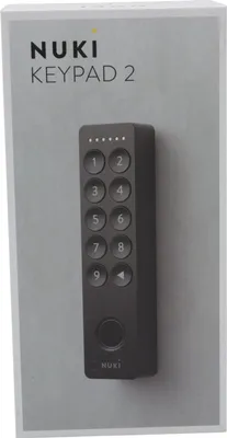 The image shows the packaging of a Nuki Keypad 2.0, with the product itself visible through a cutout or on the front.