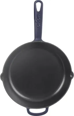 A top-down view of a black cast iron frying pan with a dark gray handle against a white background.