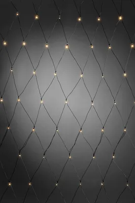 Produktbild von Konstsmide - LED Lichternetz, mit Lichtsensor und 6h und 9h Timer, 80 warm weiße Dioden, batteriebetrieben, Außen (IP44), schwarzes Kabel 2 x D 1.5V (exkl.); 3727-100