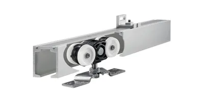 A close-up, angled view of a sliding door hardware system, showing the track and roller mechanism.