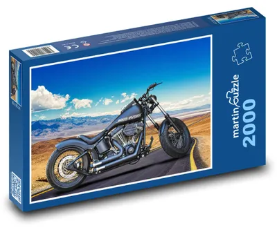 Zdjęcie produktu dla Puzzle 2000 Czarny motocykl na drodze - martinpuzzle