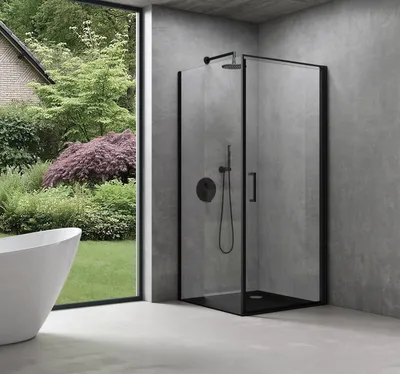 A modern bathroom with a shower cabin and a bathtub, overlooking a lush garden.