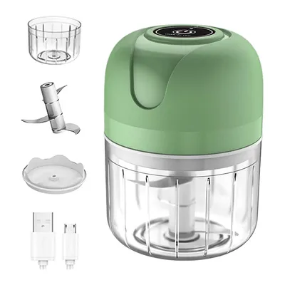 A product shot of a mini food chopper and its accessories, laid out against a white background.