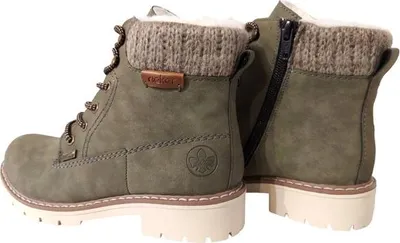 A pair of green Rieker boots with a knitted cuff.