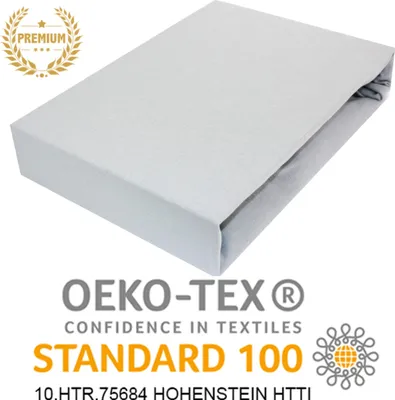 A folded fitted sheet on a white background with marketing text and logos.