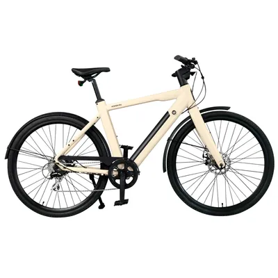 A studio shot of a cream-colored electric bicycle against a white background.