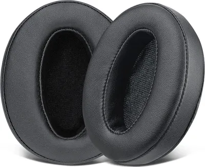 Two black ear pads for headphones are shown against a white background.